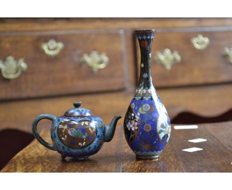 A Chinese miniature cloisonné enamel globular teapot and cover, shaped reserves decorated with a butterfly and a bird of para