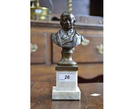 English School (19th century), a brown patinated bronze portrait bust, of a statesman, turned socle, square marble plinth, 21