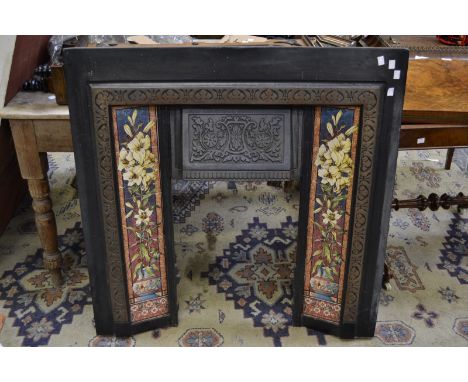 A reproduction tile back fireplace.