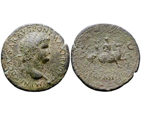 Nero Æ Sestertius. Lugdunum, circa AD 66. IMP NERO CAESAR AVG PONT MAX TR POT P P, laureate bust right, globe at point / DECV