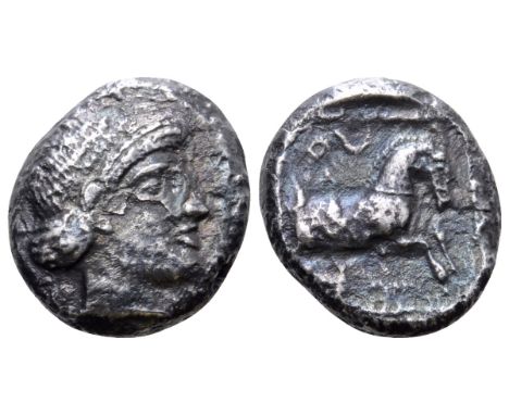 Philistia, Gaza AR Drachm. Mid 5th century-333 BC. Female(?) head right, wearing oriental hairstyle with bunched hair at the 