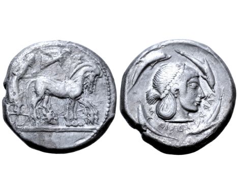 Sicily, Syracuse AR Tetradrachm. Deinomenid Tyranny. Time of Hieron I, circa 480/78-475 BC. Charioteer, holding kentron and r