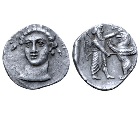 Cilicia, uncertain mint AR Obol. 4th century BC. Wreathed female head facing, turned slightly to left / Persian Great King st