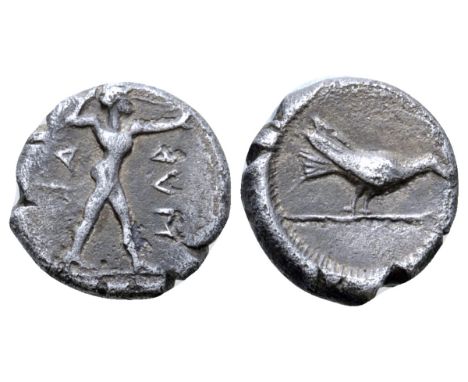 Lucania, Sybaris AR Triobol. 453-448 BC. Poseidon striding right, wielding trident; uncertain legend around / Bird (thrush) s