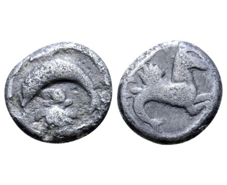 Calabria, Tarentum AR Sixth-Stater. Circa 500-480 BC. Dolphin leaping left over pellet and cockle shell / Hippocamp swimming 