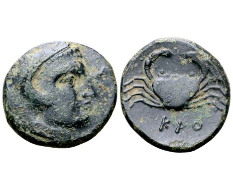 Bruttium, Kroton Æ20. Circa 350-300 BC. Head of Herakles right, wearing lion skin headdress / Crab; KPO below. HN Italy 2225;