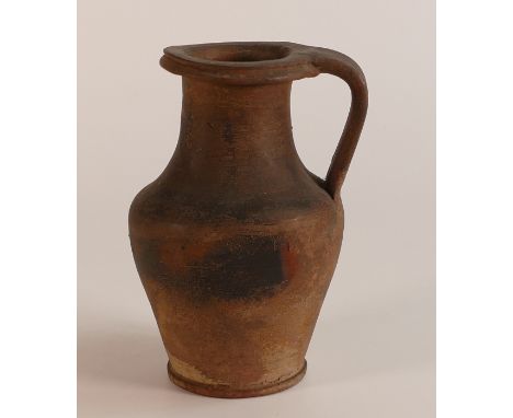 Ancient Roman Terracotta hand thrown jug. Handwritten 'Sicily' to base. Height: 12.5cm