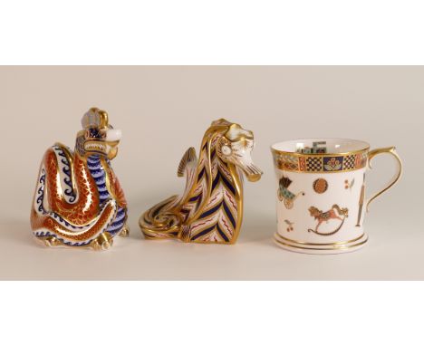 Three Royal Crown Derby paperweights to include Dragon (gold stopper), Mug and a Seahorse (silver stopper) (3)