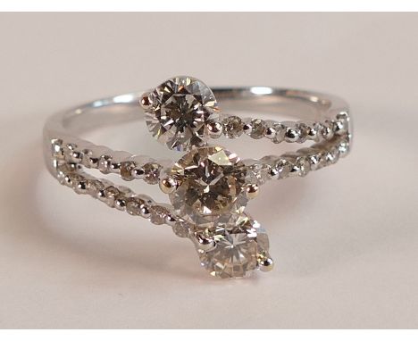 3 stone Diamond twist ring - 0.5ct central diamond flanked by 2 x 0.4ct diamonds of good colour and clarity, decorated with 2
