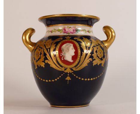 Minton gilded two handled vase, decorated with portrait panels on royal blue ground, h.11.5cm.