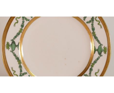 Spode Copelands, an impressive Neo-Classical dinner service painted with green Grecian urns and garlands with bows. Gilt bord