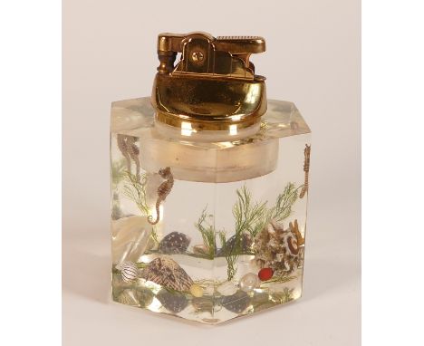 Vintage "Clean Flint" Lucite hexagon shaped lighter, with inside decorated with sea bed, shells, sea horses, with USA brass l
