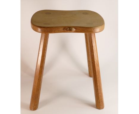 Robert 'Mouseman' Thompson (1876-1955), four legged stool on octagonal Legs. Signature carved mouse motif to one edge. Height