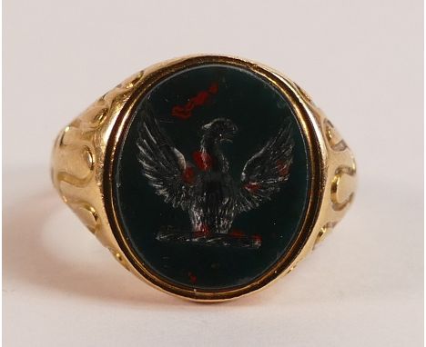 18ct Gold ring set oval engraved falcon intaglio bloodstone seal, size K, maker RNW, 19th century, weight 10.6g.