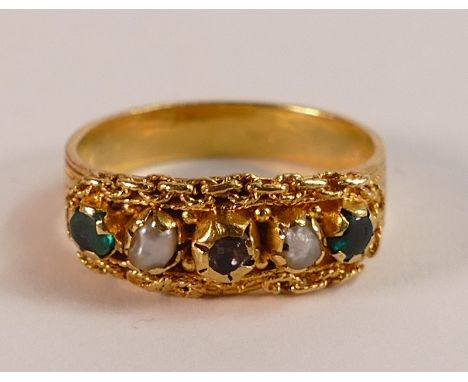 An interesting and unusal gem set ring of early appearance, origin not identified, but with early design work to the shank.  
