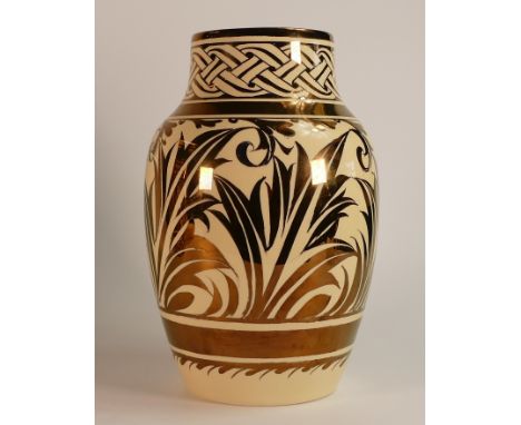 Gordon M. Forsyth, silver Lustre Baluster vase. Decorated with characteristic medieval type knot and foliate designs. Height:
