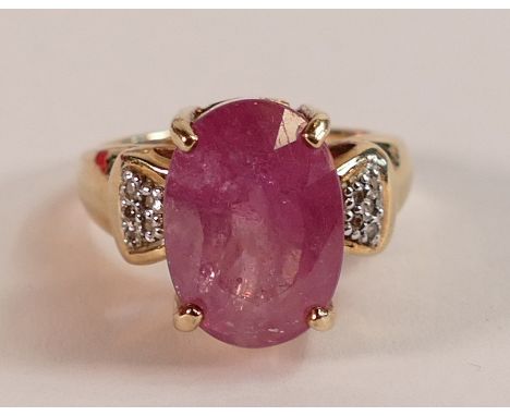 9ct Gold hallmarked Diamond and large Rubelite (or similar gemstone) ring.  Central stone measures 14mm x 10mm appx.  Ring si