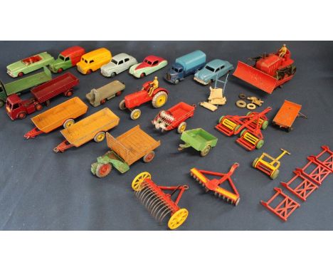 Selection of Dinky toys including farming accessories: disk harrow, hay rack, farm trailers, manure spreader &amp; vehicles: 