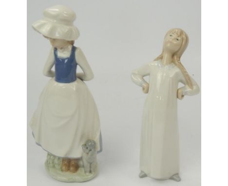 Nao and Lladro figurines, comprising young girl with poodle and young girl in nightshirt, 23cm and 20cm high respectively.