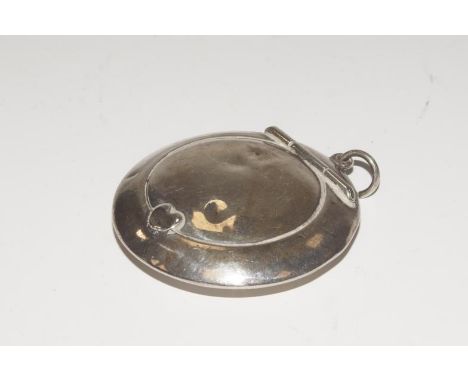 A silver circular pendant powder compact, Birmingham 1920.