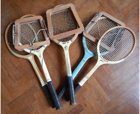 Five vintage wooden tennis racquets, and three presses, including two Dunlop racquets, two Slazenger racquets and a Victory r