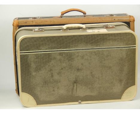 Two vintage suitcases.