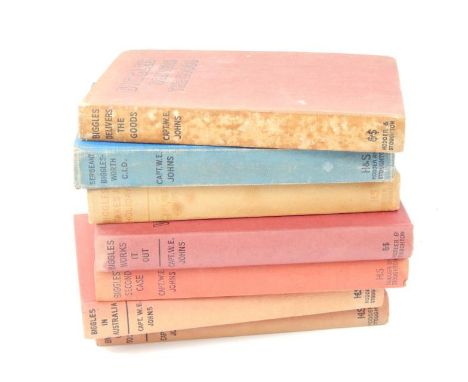 Johns, Captain W E A.  A collection of seven Biggles books, to include a copy of Biggles Delivers The Goods, bearing signatur