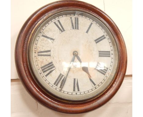 A late 19thC oak cased circular Ansonia wall clock, with white enamel dial and Roman numerals, with glazed door and brass bez