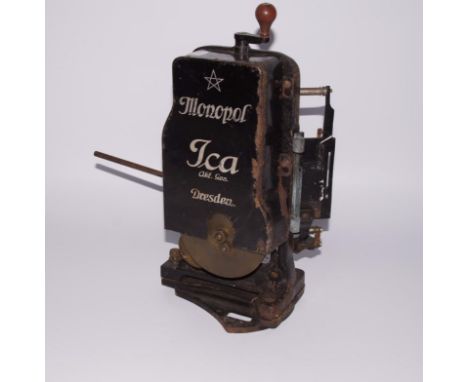 A Monopol ICA 1914 35mm film projector, marked Dresden with interior section marked Heimlicht of Berlin, 35cm high.