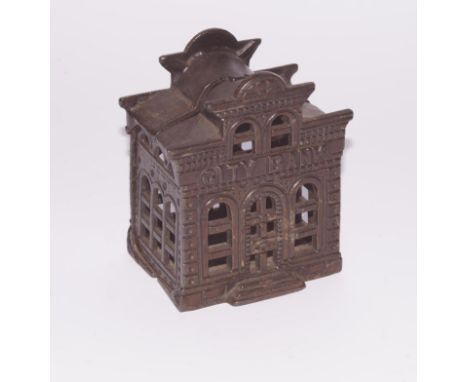 A late 19thC cast iron City Bank, of architectural form, 11cm high.