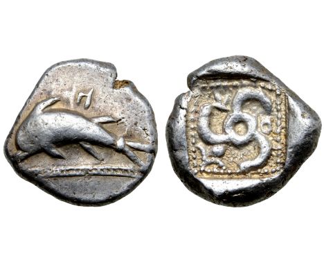 Dynasts of Lycia, Kuprilli AR Stater. Circa 480-440 BC. Dolphin leaping to left over decorative line; symbol above / Triskele