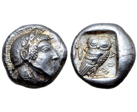 Attica, Athens AR Tetradrachm. Circa 475-470 BC. Head of Athena right, wearing earring and crested Attic helmet decorated wit