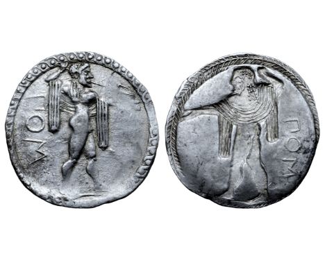 Lucania, Poseidonia AR Stater. Circa 530-500 BC. Bearded Poseidon, diademed and wearing chlamys over shoulders, advancing rig