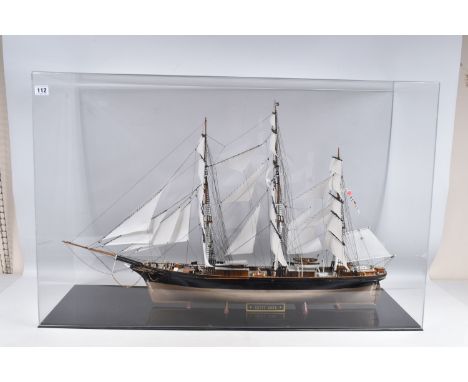 A CONSTRUCTED REVELL PLASTIC KIT OF THE CUTTY SARK HOUSED IN A PERSPEX DISPLAY CASE, kit has been constructed and finished to