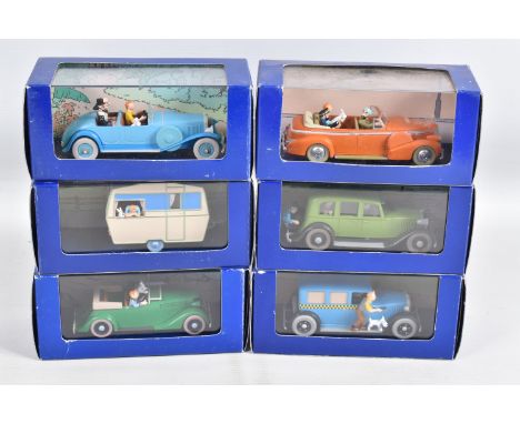 SIX BOXED EN VOITURE TINTIN MODEL VEHICLES, the first is a Le Taxi De Tintin En Amerique, numbered 2 118 004, the second a Le