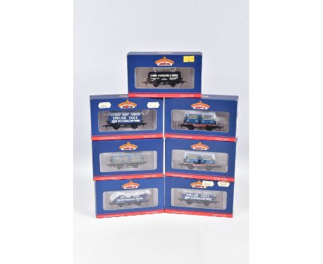 SEVEN BOXED OO GAUGE BACHMANN BRANCHLINE MODEL RAILWAYS ROLLING STOCK, to include two of the Conflat Wagon with AF Containers