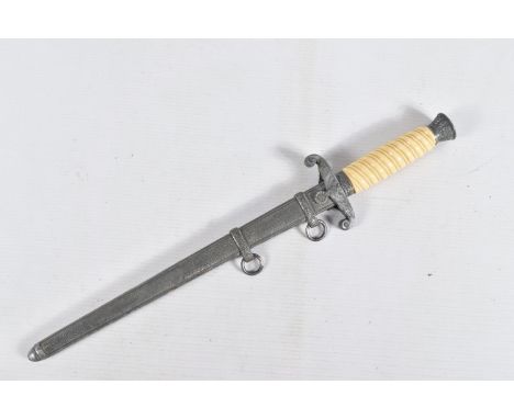 A GERMAN ARMY DAGGER MADE BY WKC OF SOLIGEN, this has got its original scabbard and the blade is clearly marked WKC and the k