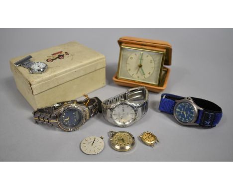 A Collection of Vintage Wristwatches and a Travel Alarm Clock 
