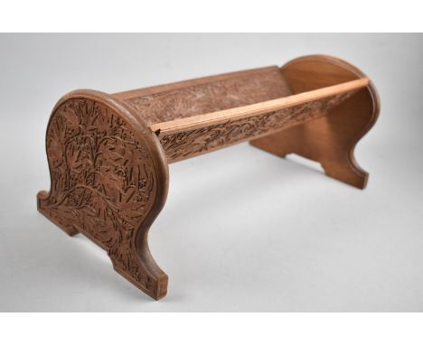 A Carved Teak Far Eastern Book Trough, 41cms Wide 
