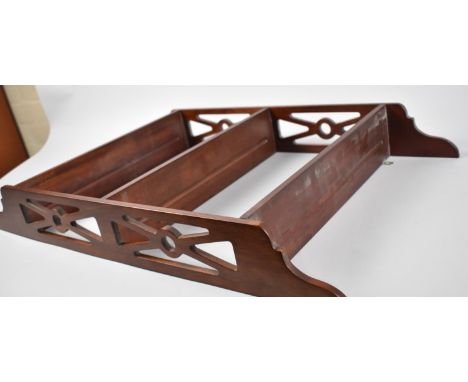 A Modern Mahogany Three Shelf Wall Hanging Unit with Pierced Supports, 65cms High 