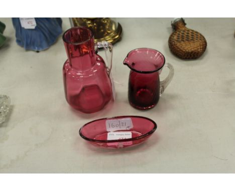 Three pieces ruby glass and oval 'Mary Gregory' pin tray