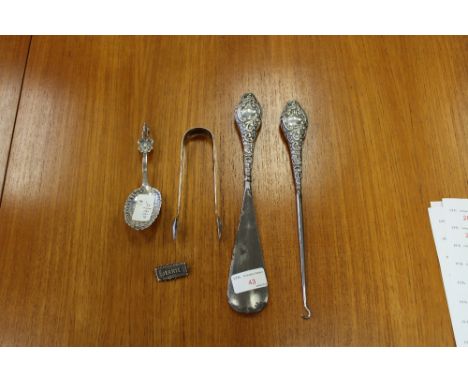 Dutch silver caddy spoon, Georgian silver tongs, silver handle button hook and shoe horn