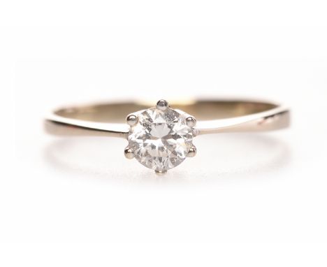 DIAMOND SOLITAIRE RINGwith a six claw set round brilliant cut diamond of approximately 0.36 carats, hallmarks worn, size M, 1