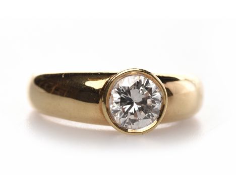 EIGHTEEN CARAT GOLD DIAMOND SOLITAIRE RINGset with a round brilliant cut diamond of approximately 0.90 carats in a collet set