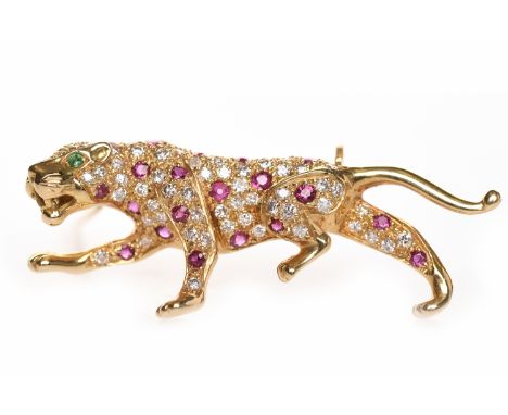 EIGHTEEN CARAT GOLD DIAMOND AND RUBY SET PANTHER MOTIF BROOCHthe body of the panther with grain set round diamonds and rubies