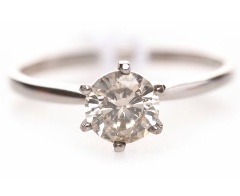 EIGHTEEN CARAT GOLD DIAMOND SOLITAIRE RINGset with a round brilliant cut diamond of approximately 0.82 carats on a tapered sh
