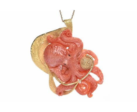 IMPRESSIVE CORAL OCTOPUS MOTIF PENDANT ON CHAINthe octopus carved from coral and mounted in eighteen carat gold, with decorat