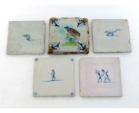 A good early 17th. century polychrome tile of a kingfisher on a branch, trefoil quadrants, together with four 18th. century b