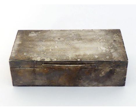 A silver engine-turned cigarette box by Asprey & Co. Ltd., London, 1931, cedarwood-lined and divided into three compartments,