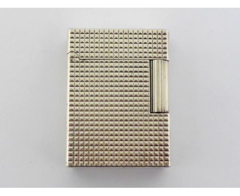 ST Dupont, a stainless steel lighter, of hobnail design, no condition issues 
